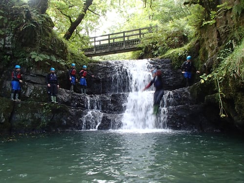 Graduates gorge walking at company kick-off